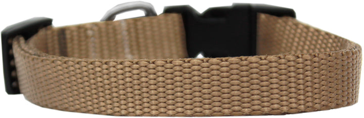 Brown dog collar with a black buckle on a white background