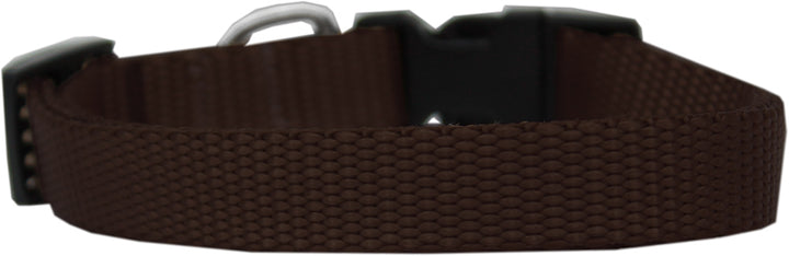 Brown dog collar with a black buckle on a white background