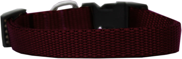 Maroon dog collar with a silver buckle on a white background